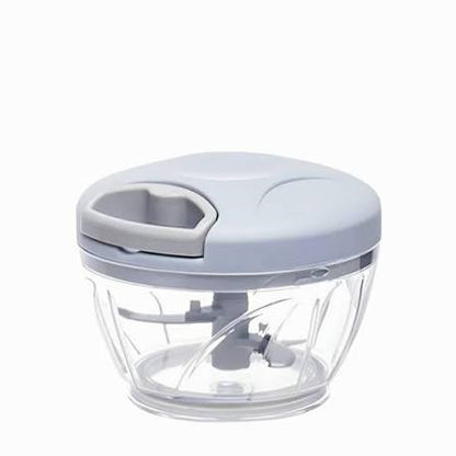 Mini chopper used chopping meat garlic chili on kitchen table